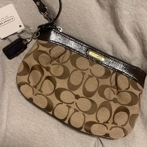 Coach wristlet brand new still has the Tag
